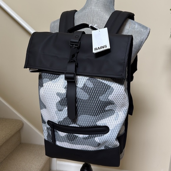 New Rains Black and Gray Unisex camo look Backpack.